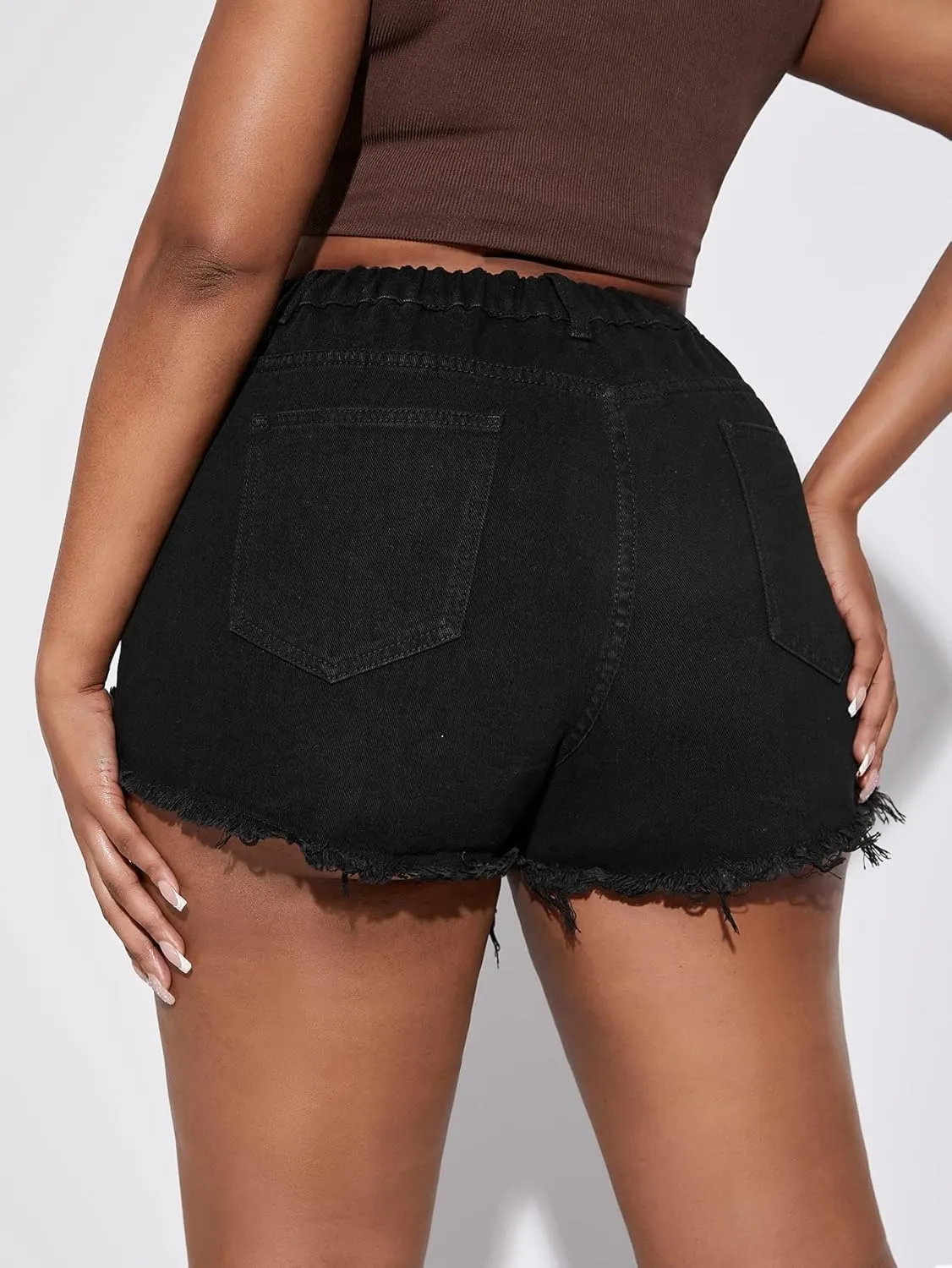 WDIRARA Women's Plus Size High Waisted Button Ripped Raw Hem Denim Shorts